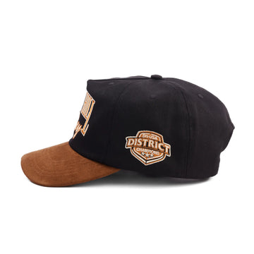Black and brown Shadow Hill Hockey cap with gold embroidered text reading "Shadow Hill 1994 Hockey