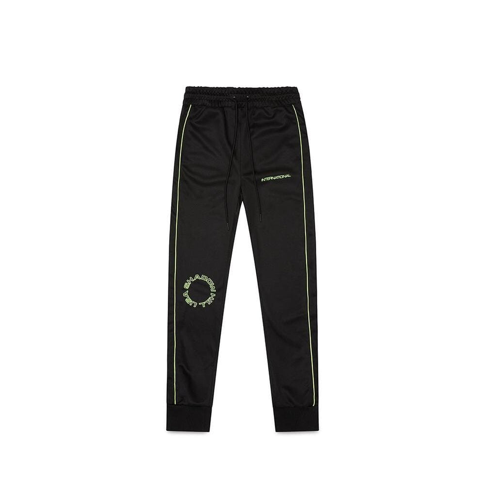 NEON AIRPORT TRACKPANTS