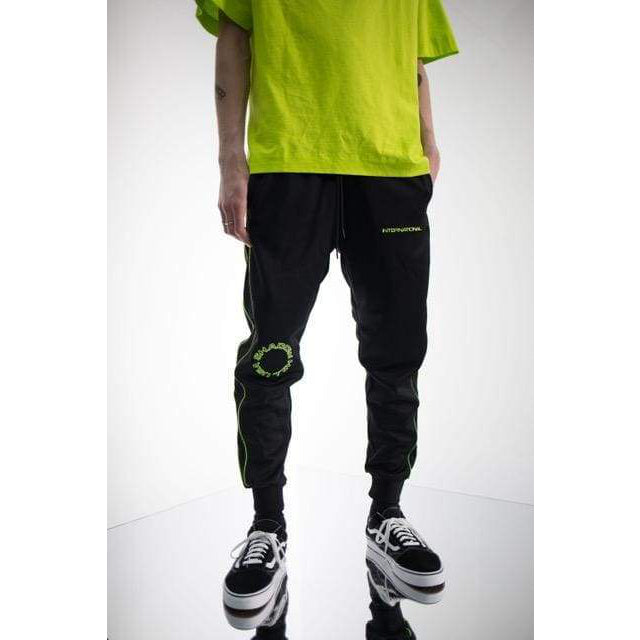 NEON AIRPORT TRACKPANTS